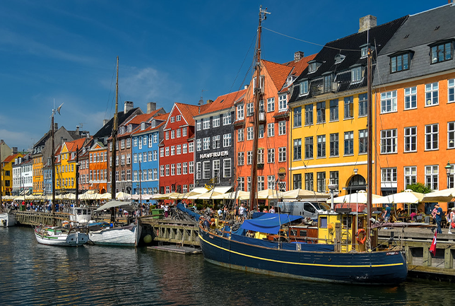Nyhavn is one of Copenhagen's most iconic landmarks. The 17th-century waterfront, canal and entertainment district stretching from Kongens Nytorv to the harbour front just south of the Royal Playhouse is lined by brightly coloured 17th and early 18th